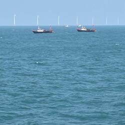 Fishing boats and windmills as we sailed into Hong Kong.