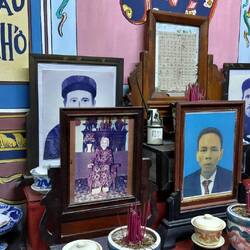 Photographs behind the shrine