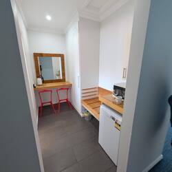 Had a small kitchen with a refrigerator and a nothing freezer