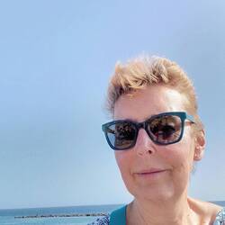 V windy by the beach as can be seen by my hair!
