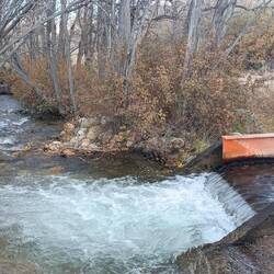 Mini aqueduct over a natural creek channel to divert water towards the main aqueduct to LA