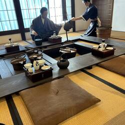 Depiction of serving Sake with dinner.