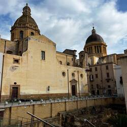 Looking back to Purgatory and St Thomas domes over the city excavation.