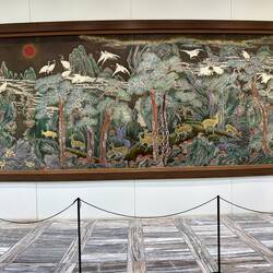 Large mural built entirely of sea shells.