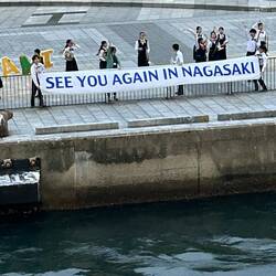 Large farewell sign as the ship left the pier.
