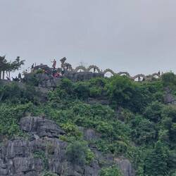 View over to the lying stone Dragon of Hang Mua (Negra Long)