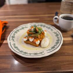 Smoked trout, confit potato cakes, creme fraiche, salmon roe, dill, poached egg. Sensational.