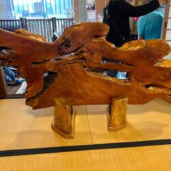 Beautiful wood sculpture on the way into restaurant.