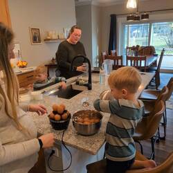 Beckett and Kolbe helping in the kitchen