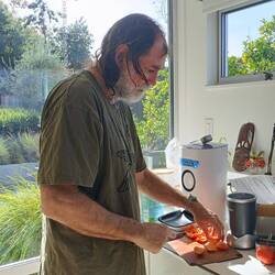 Slicing up persimmons 😀; we enjoyed picking and eating these