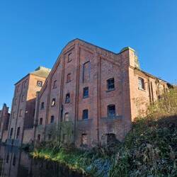 Grade II Langley Maltings. Closed in 2006, burned in 2009.