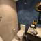 All the bathroom walls are tiled