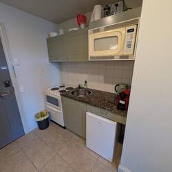 Another kitchen with an oven. A dishwasher, a refrigerator, a microwave