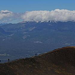 Walking on the edge of a secondary crater. Osorno Volcano.