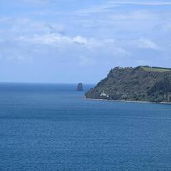 Tower Rock is the small one off the coast. You can see that from pictures of hot water beach
