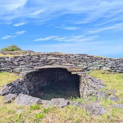 A restored stone house in Orongo