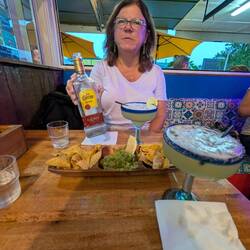 Chips and guac for an appetizer.Tim's drinking Margaritas and Audrey's drinking tequila straight....