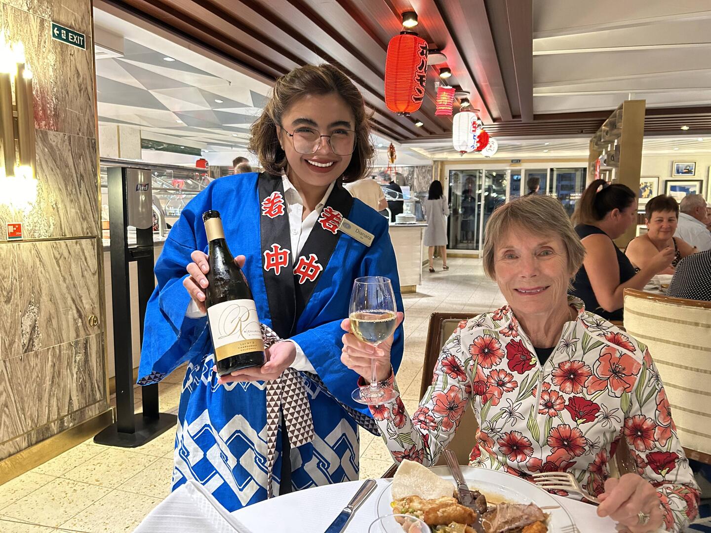 One of our favorite servers dressed up for the Asian themed dinner.