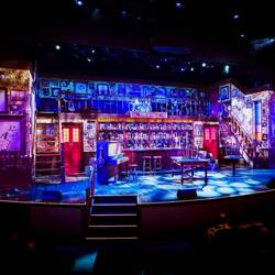 Pre-show "Choir of Man" stage — Onboard NCL Encore.