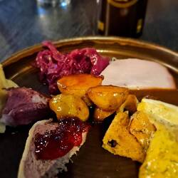 Ham, smoked lamb, caramelised potatoes, reindeer paté and Herring with red cabbage.