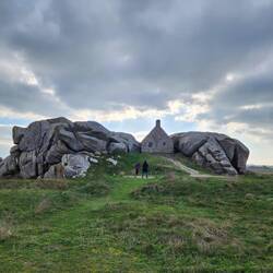 The lookout is built around huge granite rocks and has a stone roof to stop wood theft