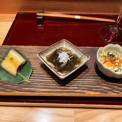 Left to right: grilled eel with yuzu kosho, seaweed and ginger/fish, persimmon tofu spinach salad