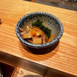 Sea cucumber in vinegar, sugar. Yuzu zest, seaweed, citrus