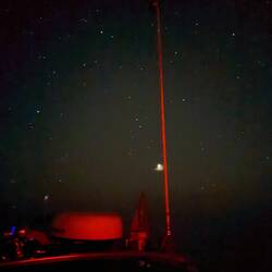 Good stargazing here. That bright one by the antenna is a planet. We see two tonight.