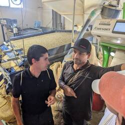 Pablo and Rodrigo explaining the coffee works