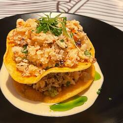 Seafood tostadas with greens oil and white sauce