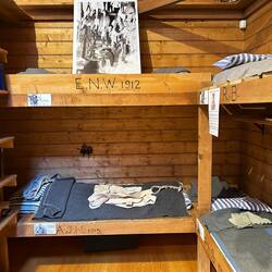 Bunks. Note the washing hanging in the photo of the time