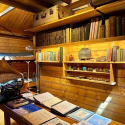 Walls were lined with books, Encyclopedia Brittanica top left