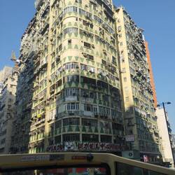 Kowloon building on bus ride - note multi level washing lines.