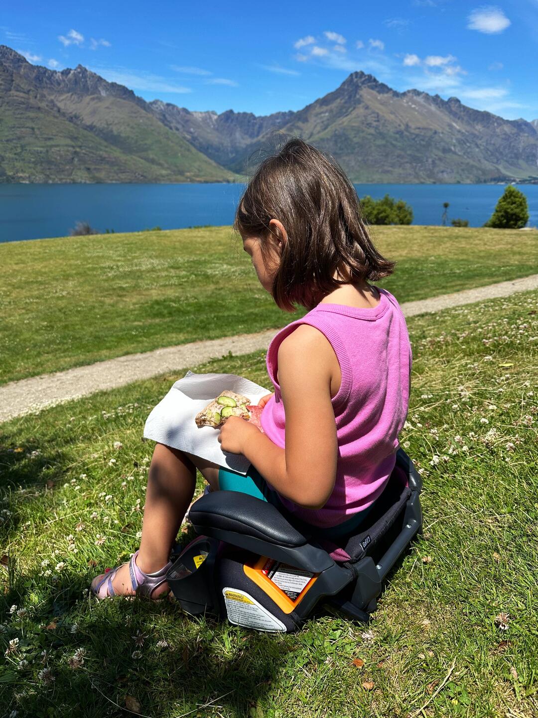 Alina doesn't like sitting in real grass