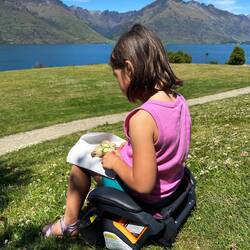 Alina doesn't like sitting in real grass