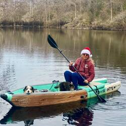Returning from our paddle and float on the Santa Fe. Moki's reindeer antlers have fallen back.