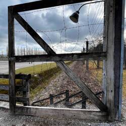 Barb wire gate & ditch leading to the crematorium area