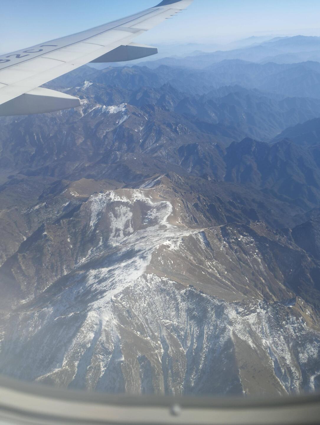 Snow capped mountains en route to X'ian