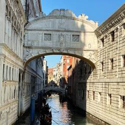 Bridge of whispers connects Doges Palace with the prison