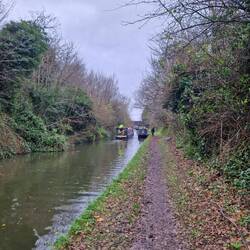 The towpath was less muddy here but signs nearby made (im)polite requests for boaters not to moor.