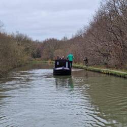 This boat was grounded badly against the towpath. We tied it to Rainboat and pulled it free.