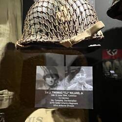 Helmet from a cousin of the Niland brothers who was also with them, luckily survived