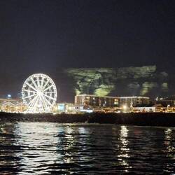 Table mountain lit up to the right of the wheel, it looked like cloud to me.