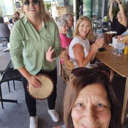 Shaza playing the bongos