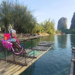 And off we go down the Yulong River with Ann looking serene on her raft.