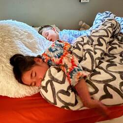 They've been sharing a bed or room for the last 6 weeks, so cuddled in Alina's bed when we got home.