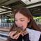 Lara taking a brownie cookie very seriously