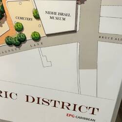 YES, Synagogue Lane is adjacent to Bruce Alley