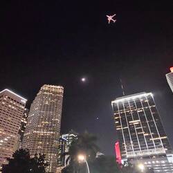 The Moon and Venus getting photobombed by a plane coming out of MIA