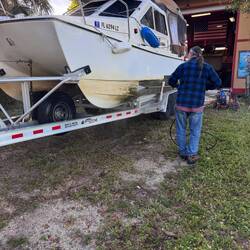 Back home pressure washing 10 months worth of green, brown, black and yellow gunk on the hull
